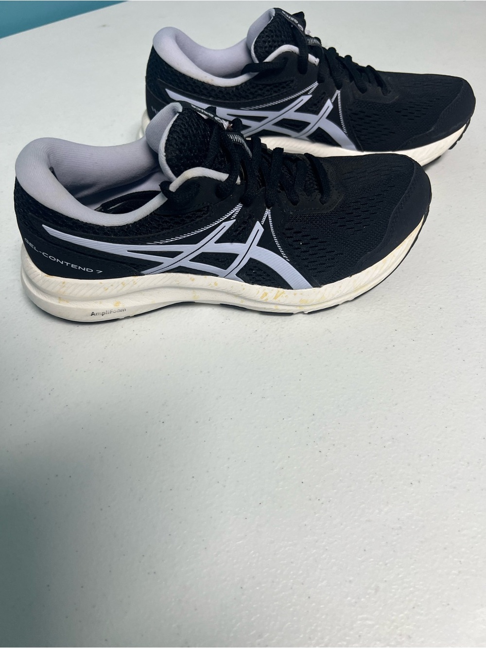 Asics women's Black and White Running gel running shoes. Size 7.